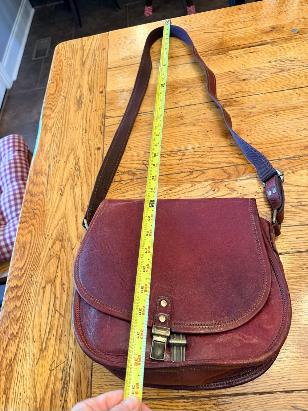 Leather Crossbody Saddle Bag in Burgundy Red